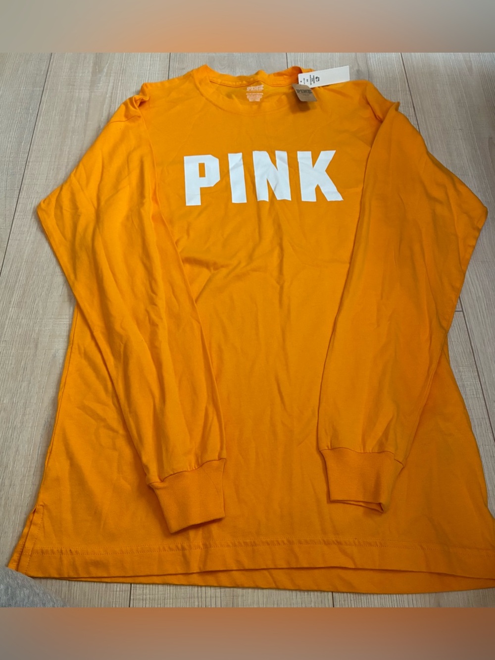 PINK Victoria's Secret Orange Longsleeve with White Logo Print
